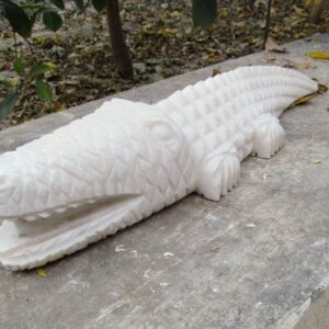 White marble hand carved crocodile