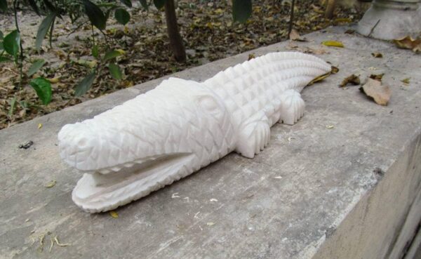 White marble hand carved crocodile