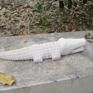 White marble hand carved crocodile