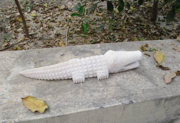 White marble hand carved crocodile