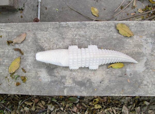 White marble hand carved crocodile